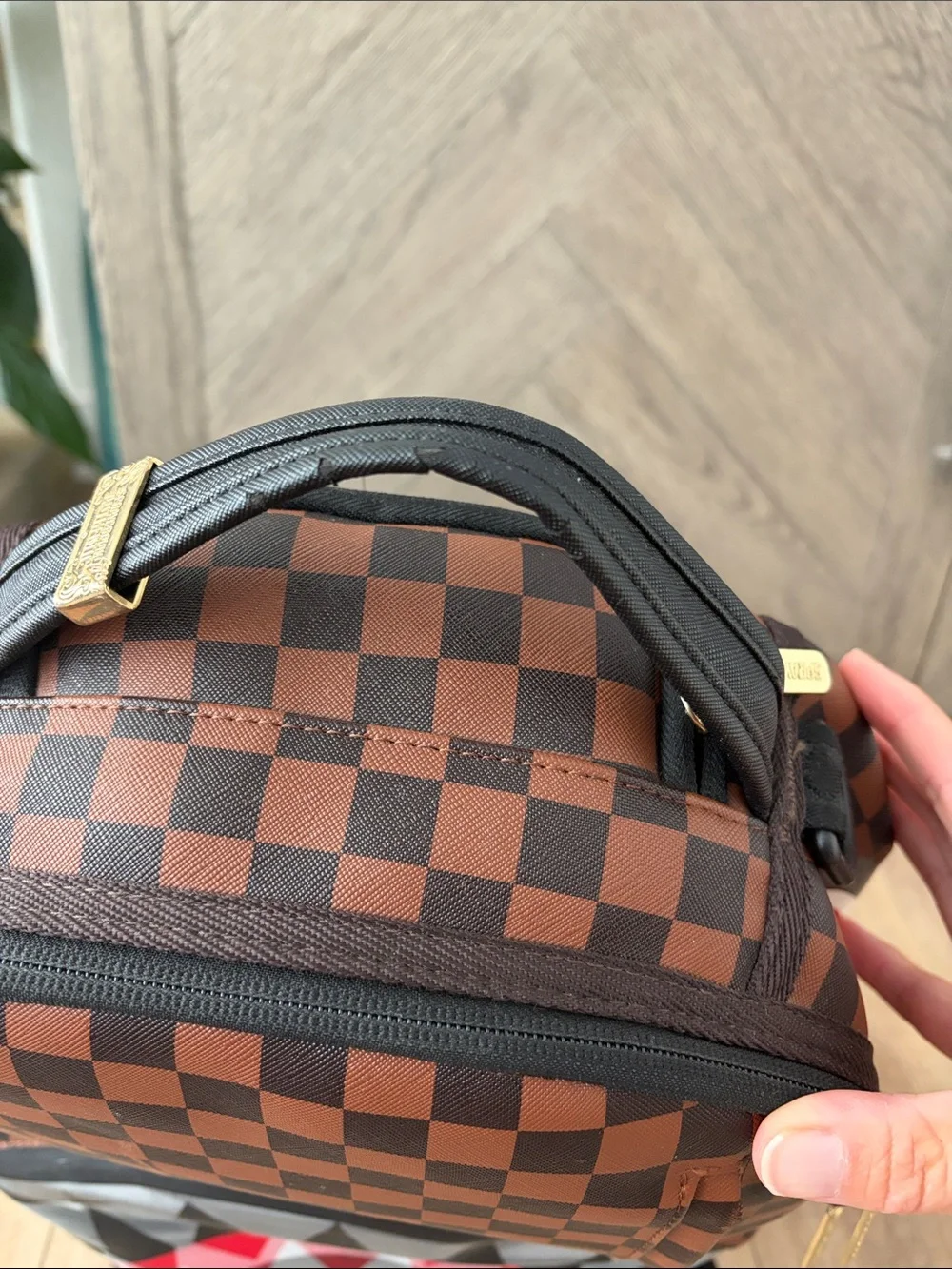Sprayground Brown Checkerboard Backpack with Red & White Shark Mouth